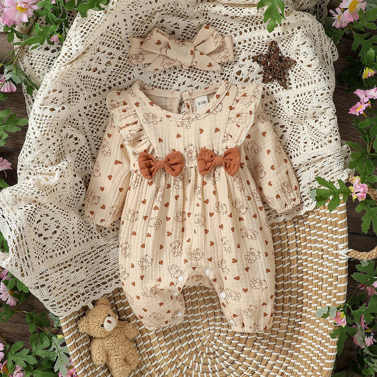 Macacão infantil feminino manga longa estampa floral com laço