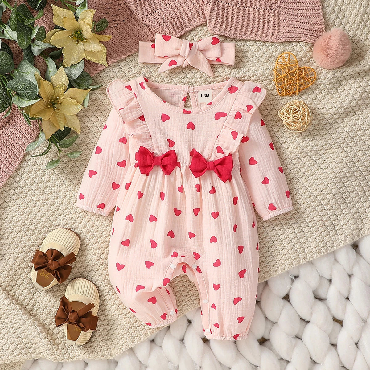 Macacão infantil feminino manga longa estampa floral com laço