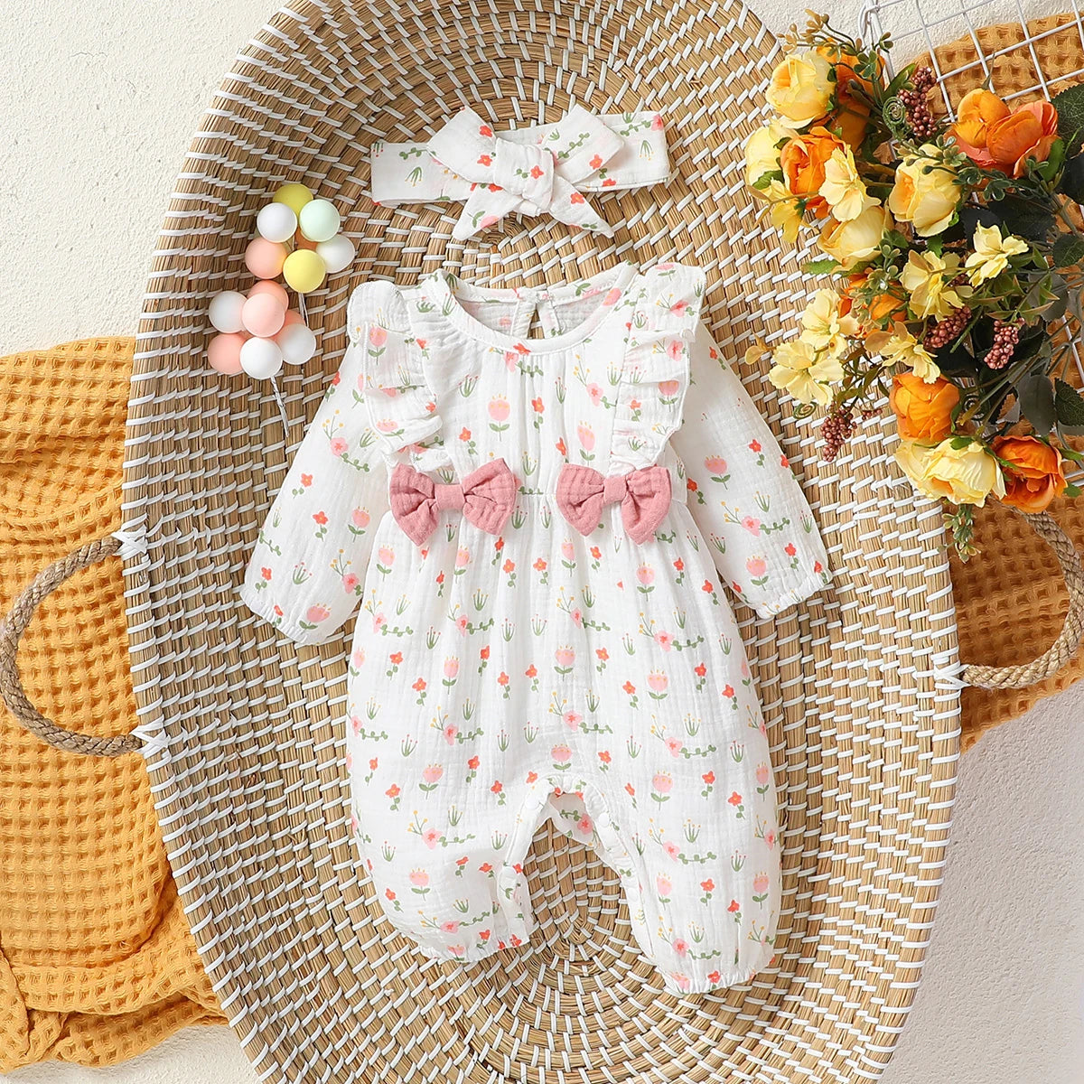 Macacão infantil feminino manga longa estampa floral com laço
