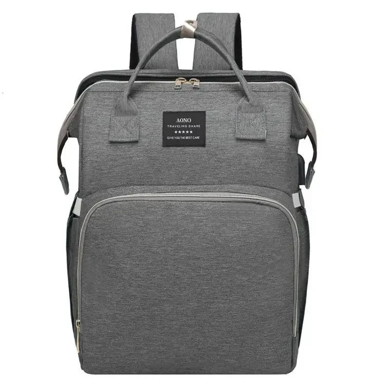 Bolsa para maternidade vira mini berço portátil com vários bolsos e com mosqueteiro