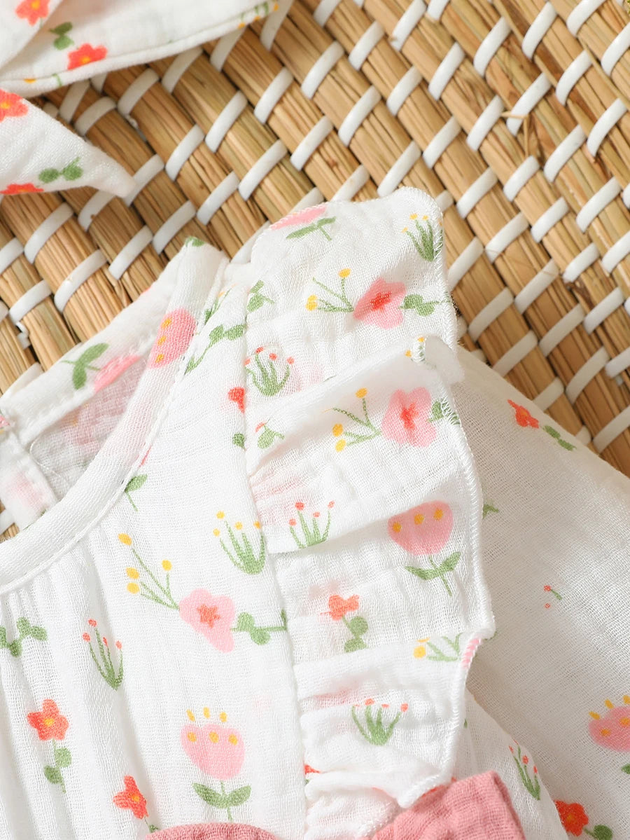 Macacão infantil feminino manga longa estampa floral com laço